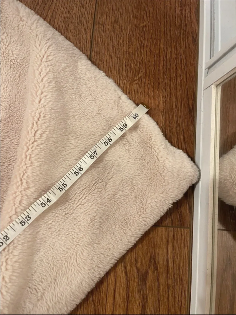 UnHide blanket in cream 60 by 80